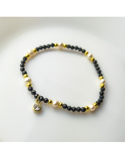 Srebrna bransoletka z perełkami i kulkami