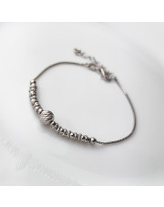 Srebrna bransoletka z nacinaną kulką - pr. 925